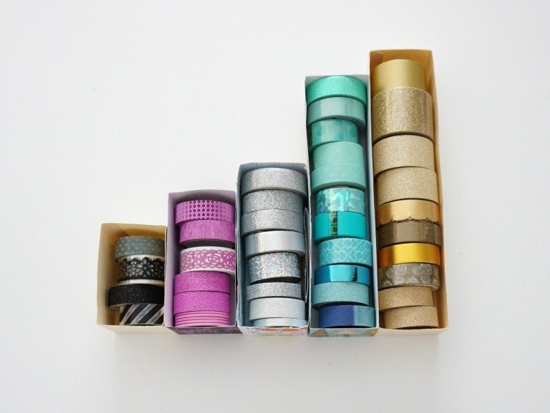 Organize Washi tape in different size SVG Box Templates to fit the number of rolls.